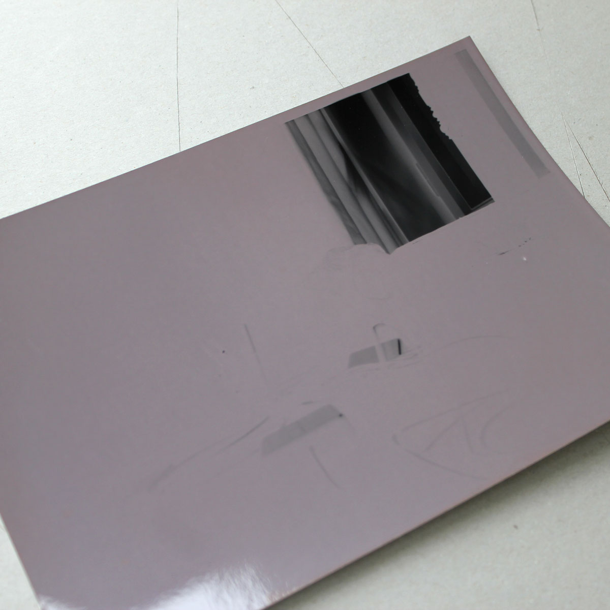 How do you develop pictures in a darkroom? Fixing process.